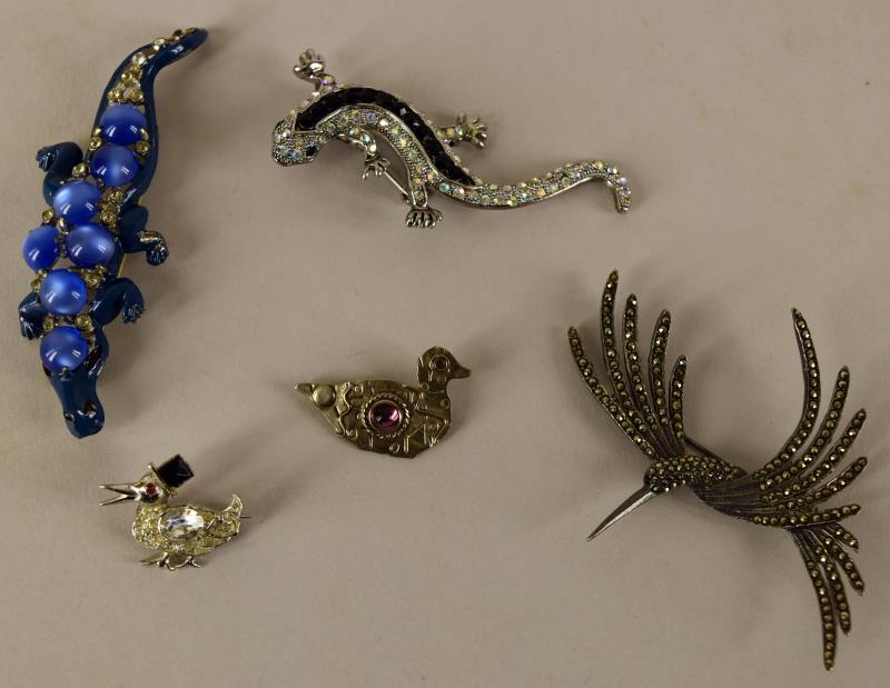 Group Of Animal Pins: Consisting Of Five Pins Of A Marcasite Sterling Hummingbird, A Lizard, A Duck Signed Deborah Roberts, A Walking Duck With A Hat And An Alligator, The Hummingbird Measures 3.5" Long An 2.5" Wide. All A