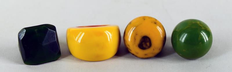 Four Bakelite Rings: Consisting Of Two Green, A Butterscotch And A Mottled Brown And Butterscotch. The Round Top Green Is Size 6.5, The Mottled Brown And Butterscotch And Solid Green Are Size 5 And The Butterscotch Dome T