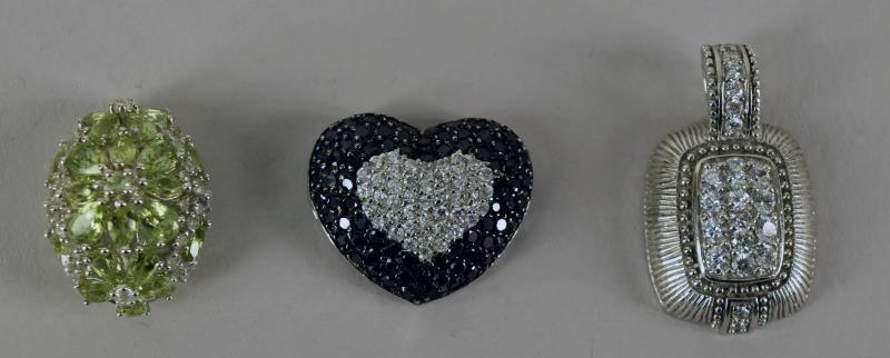 Judith Ripka Sterling & Cz Pendant: Featuring A Signed Judith Ripka Sterling And Cz Pendant, Measuring 1.5" X 1". Together With Two Additional Sterling Silver Slide Pendants With Peridot And A Black & Rhinestone Heart Pendant, Both Mark