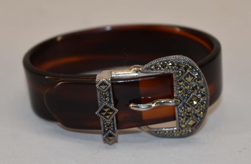 Sterling Silver & Marcasite Buckle Bracelet: Featuring A Sterling Silver And Marcasite Buckle With An Acrylic Band. Marked Sterling On The Inside Buckle. The Bracelet Measures 2.25" On The Inside And .75" Wide.