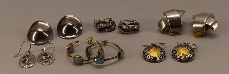 Six Pairs Of Sterling Silver Earrings: Featuring Marcasite And Rhinestone, Inlaid Amethyst, Sterling And 24k Gold, Sterling And Quarts And Two Pair Unmarked Sterling.