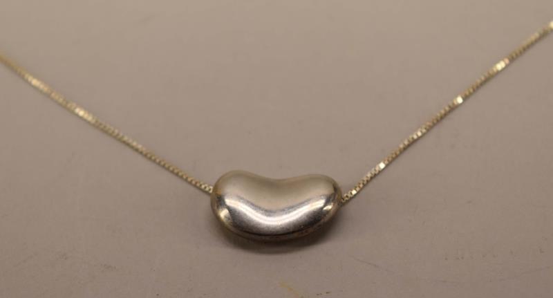 Peretti For Tiffany & Co. Sterling Bean Necklace: Featuring The Elsa Peretti For Tiffany & Co. Sterling Necklace, 20th C., Pair Bean Design, Stamped Verso, .75"h X .25"w On A 29" Chain, Approx. 11.8g