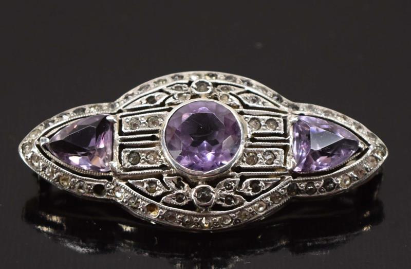 Amethyst & Sterling Art Deco Pin Or Brooch: A Stunning Amethyst And Marcasite Pin In An Art Deco Design. Marked Sterling, Measuring 1.5" Long And.75" Wide.