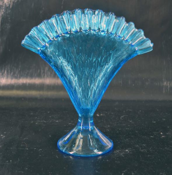 Blue Fenton Diamond Quilted Fan Vase: Featuring A Diamond Quilted And Candy Edge Top Fan Vase, Probably Older Fenton. Measuring 8" Tall And 7.5" Across The Fan, 2.25" Deep. In Good Condition, No Nicks, Chips Or Cracks. Glows Green Under A