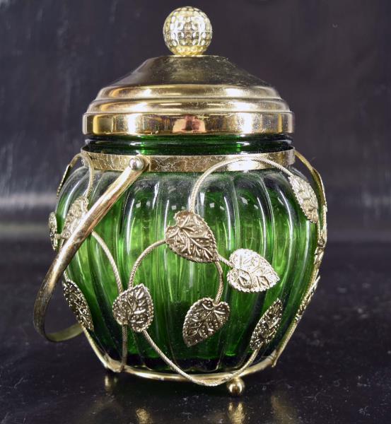 Green Glass Musical Biscuit Or Cookie Jar: Featuring A Green Glass In An Aluminum Frame, With A Musical Lid. Measuring 8" Tall And 6" Across, In Very Good Condition, No Nicks, Chips Or Cracks.