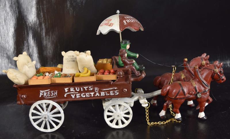 Reproduction Cast Iron Fruit Cart: Featuring The Reproduction Fruit And Vegetable Card. Measuring 7" Tall, 14" Long And 3.5" Wide, With The Fruits And Vegetables.