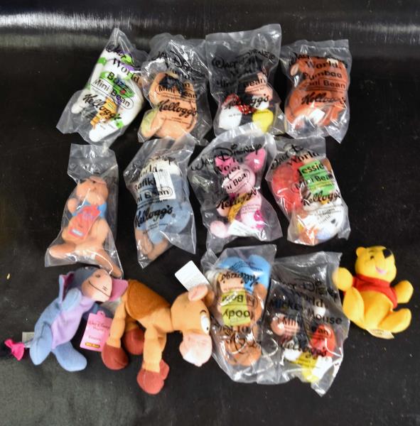 Group Of Unopened Kellogg Disney Plush Toys: Featuring Thirteen Different Disney Characters From Kellogg. Ten In The Original Package Never Opened, Three Opened. All In Good Condition.