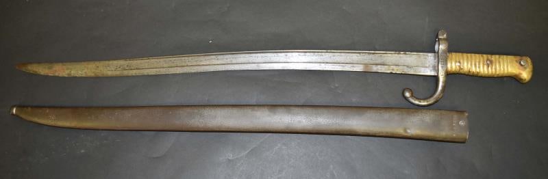 French 1866 Chassepot Bayonet St. Etienne Arsenal: Featuring The French Bayonet, Serial Number And Scabbard Do Not Match. Measuring 22.5" Blade & 27.25" Overall Length. The Scabbard Measures Almost 23.25".