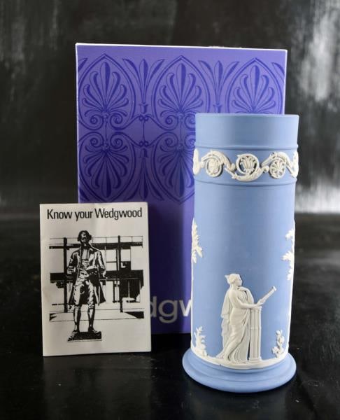 Wedgwood Blue Jasperware Vase: Featuring A Blue Vase In Original Box Measuring 6 1/2" Tall And 3" Wide. Condition Is Good With No Nicks, Chips And Cracks.
