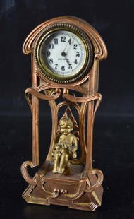 Art Nouveau Seth Thomas Bronze Clock: Featuring An Art Nouveau Seth Thomas Clock With A Porcelain Dial. Measuring 8.25" Tall, 4" Wide And 2" Deep, Currently Keeps Accurate Time. Marked On The Bottom 925, Non Magnetic.