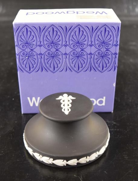 Wedgwood Jasperware Paperweight: Featuring A Dark Brown Paperweight With Medical Insignia In Its Own Box Measuring 2" Tall And 3 1/2" Wide. Condition Is Good With No Chips, Nicks Or Cracks.