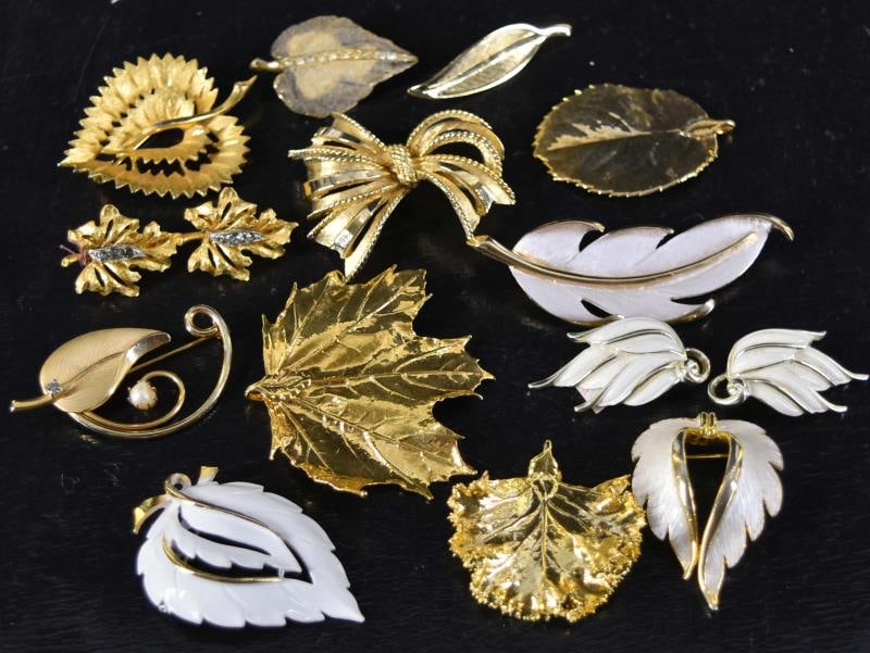 Group Of Goldtone Leaf Design Jewelry: Featuring Goldtone Leaf Pins, Earrings And Pendants. Including A Gold Plated Leaf Pendant, Florenza Earrings And Pin, Emmons Earrings, Mamselle Pin & J J Pin.