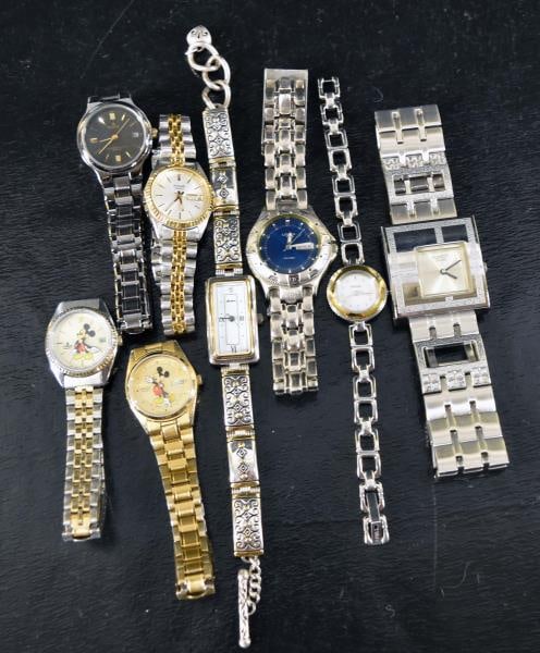 Group Of Lorus And Seiko Wrist Watches: Featuring Two Mickey Mouse Watches A Seiko And Lorus. Together With Other Pulsar, Lorus, Brighton And Other Watches. Not Working.