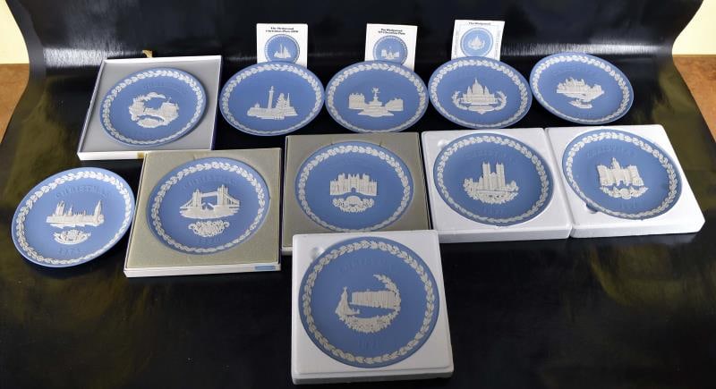 Eleven Wedgewood Blue Jasperware Christmas Plates: Featuring 1969, 1970, 1971, 1972, 1973, 1974, 1975, 1976, 1977, 1978. 1979 All Measuring 8" Wide X 3/4" Tall. 7 Original Boxes Are Included. All Items Are In Good Condition With No Nicks, Chips Or Cra