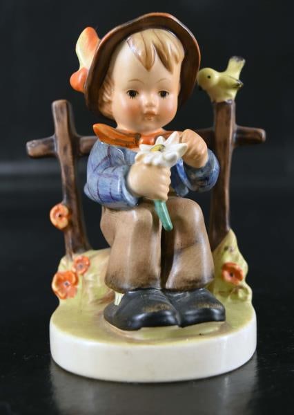 Hummel She Loves Me, She Loves Me Not #174 Tmk 2: Featuring Hummel She Loves Me, She Loves Me Not Figurine Bearing Full Bee Hallmark #2 Measuring 4 1/2" Tall X 3" Wide. Condition Is Good With No Chips, Nicks Or Cracks.