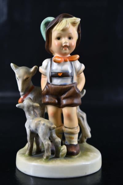 Hummel Little Goat Herder #200/1 Tmk 2: Featuring Hummel Little Goat Herder Figurine Measuring 5 1/2" Tall X 3 1/2" Wide. Condition Is Good With No Chips, Nicks Or Cracks.