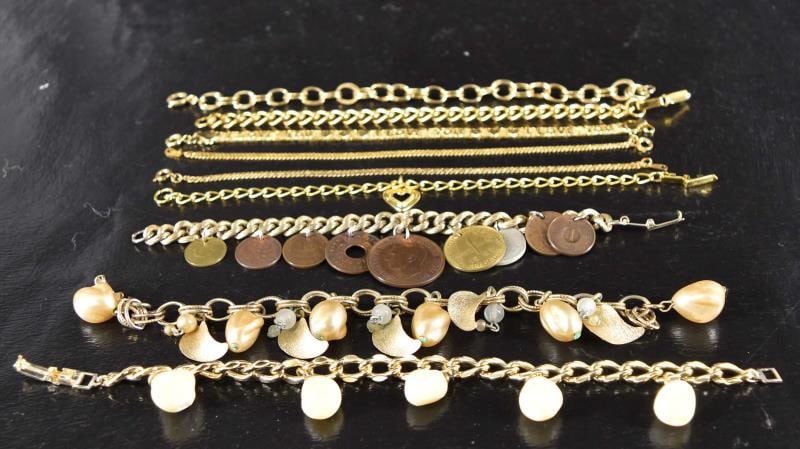 Nine Goldtone Chain Bracelet: Featuring Nine Goldtone Various Chain Bracelets, With Faux Pearls, Coins, Hearts, Etc.