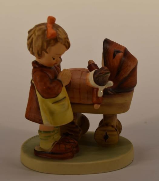 Hummel #67 Little Doll Mother Figurine: Featuring The Hummel #67 Little Doll Mother Measuring 4.25"tall With Hallmark #5. Good Condition, No Nicks, Chips Or Cracks.