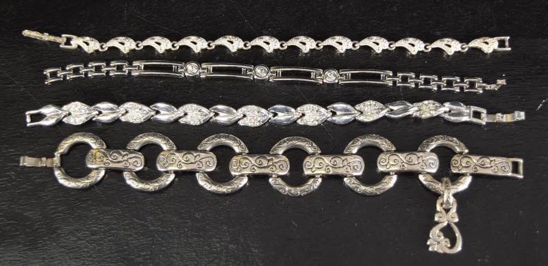 Four Contempoary Silver Tone Chain Link Bracelets: Featuring A Brighton Bracelet And Three Rhinestone Bracelets, Measuring Approximately 7" Long, In Good Condition.