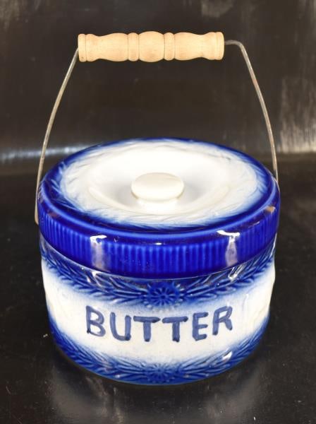 Blue & White Butter Crock Wire Bail Handle: Featuring A Blue & White Butter Crock With A Wire Bail Handle And Embossed Cows On The Side, Measuring 5" Tall And 7" Across. Good Condition, No Nicks, Chips Or Cracks, Vintage Not Antique.