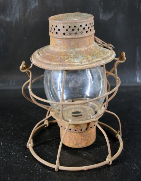 D & R Railroad Lantern: Featuring The Dardanelle & Russellville Railroad In A Hanlan St. Louis Frame. Measuring 10" Tall And 7.25" Across The Bottom, The Globe Loose In The Frame And The Frame Is Rusty.
