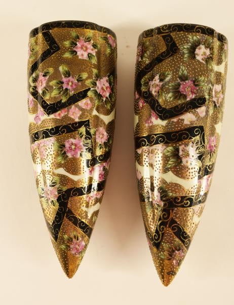 Pair Of Asian Wall Pockets: Featuring A Pair Of Wall Pockets With Black And Gold Trim With Pink Flowers. Each Measures 9" Tall X 3 1/2" Wide. Condiition Is Good On Both Items With No Chips, Nicks Or Cracks.