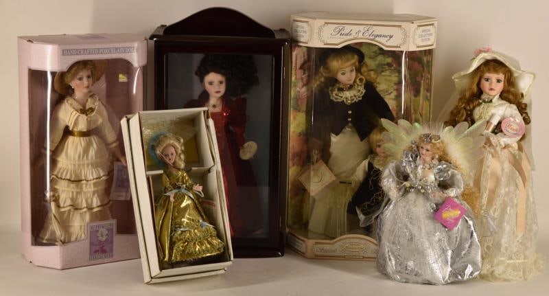 Group Of Fashion Porcelain Dolls: Featuring Six Porcelain Dolls Including Cammellia Garden Doll With Swarovski Crystal Jewelry, A Silver Fairy, A French Court Lady Plus More. Dolls Measure From 10" To 17" Tall. All Dolls In Original B