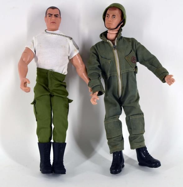 Two G I Joe Action Figures: Featuring A 1964 G I Joe Army Action Figure And A 1992 G I Joe Army Action Figure With Dog Tags. Both Figures Measure 12" Tall. Condition Is Good With The 1964 Figure Has A Loose Leg.