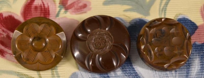 Three Carved Bakelite Buttons (1 of 7)