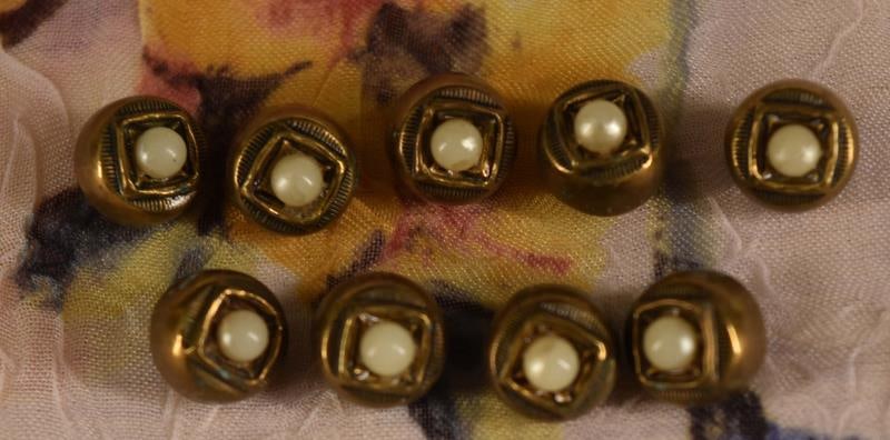 Nine Metal Set With Pearl Buttons: Featuring A Set Of Nine Brass And Pearl Buttons. National Button Society Smalls, Measuring 3/8"