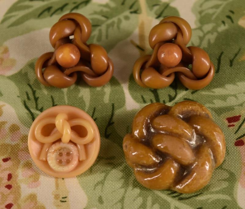 Four Extruded Celluloid Buttons (1 of 7)