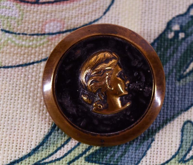 Brass Heat Textured Celluloid Background Button (1 of 2)