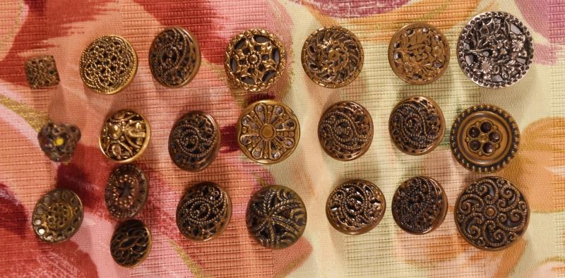 Twenty One Brass Twinkle Buttons (1 of 4)