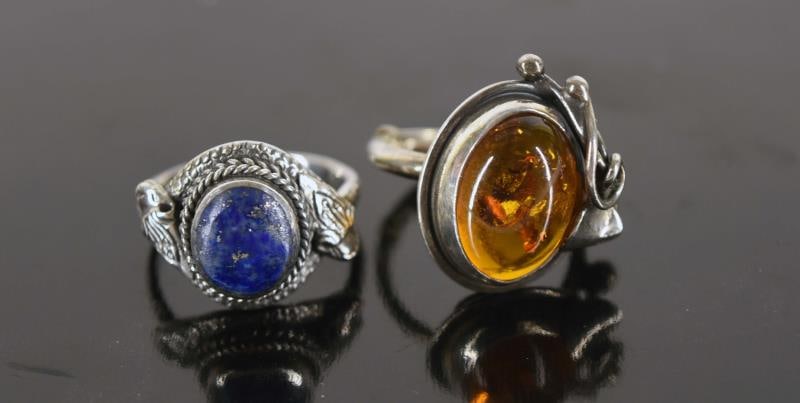 Sterling Amber And Blue Lapis Rings: Featuring A Blue Lapis Ring Marked 925, Size 7.5. Together With An Amber Silver Ring, Size 6.5, Unmarked.