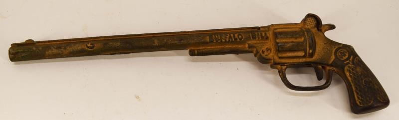 Kenton Cast Iron Buffalo Bill Cap Gun: Featuring The Single Shot Cast Iron Buffalo Bill Long Barrel Cap Gun, Circa 1925. Patent Date Of Sept. 11, 23 With A W On One Side And Possibly An S On The Other. Measuring 11 3/8" Long In Used But Fa