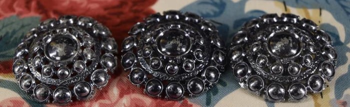 Three Blued White Metal Buttons