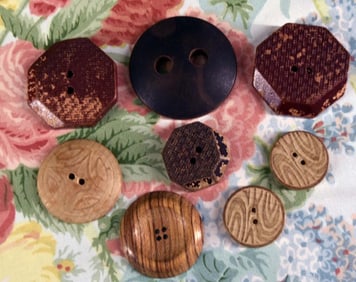 Eight Carved Wood Buttons