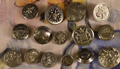 Fifteen White Metal Picture Buttons