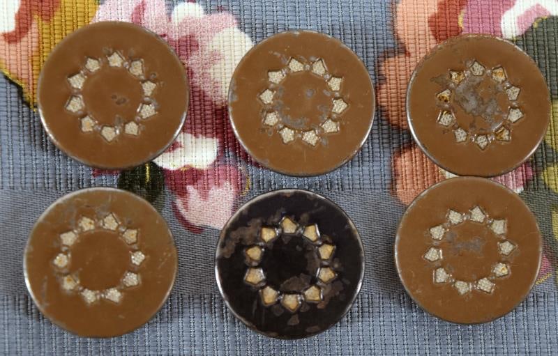 1930's Punch Design & White Metal Button Set: Featuring A Matching Set Of Six Punch Design Buttons With A White Metal Liner. Measuring 1", National Button Society Medium.