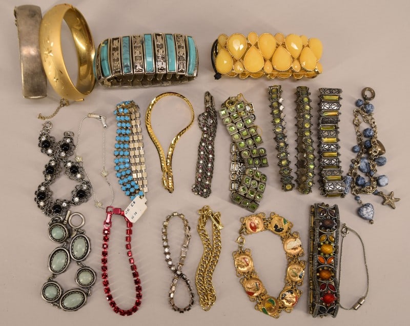 Collection Of Bracelets: Featuring A Selection Of Contemporary And Vintage Bracelets In Various Colors And Sizes.