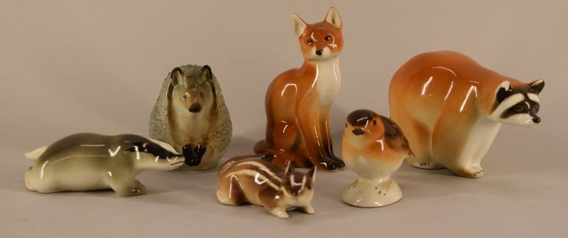 Lomonosov Imperial Russian Porcelain Animals: Featuring Six Various L F Z Lomonosov Imperial Russian Porcelain Animal Figurines. Consisting Of A Raccoon, Fox, Chipmunk, Badger, Hedgehog And Bird. The Largest Raccoon Measures 3 1/2" Tall, 5 1/2" L