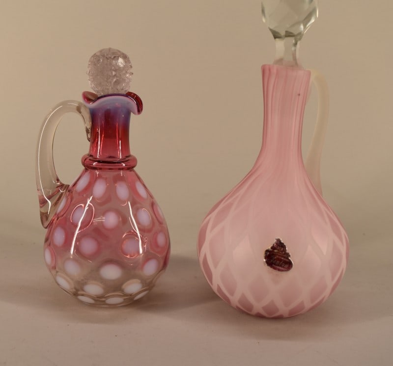 Fenton Diamond Satin & Cranberry Coin Spot Cruets: Featuring The Pink Fenton Diamond Satin Glass Cruet, Measuring 8" Tall And 4" Wide, With The Original Fenton Foil Label. Together With The Fenton Cranberry Coin Spot Cruet, Measuring 6 1/2" Tall And 3