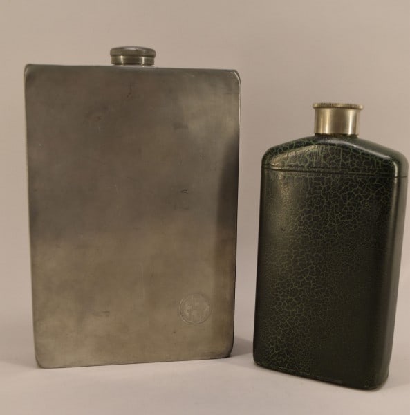 Sheffield & Stanley Water Flask: Featuring The James Dixon & Sons Sheffield England 64 Oz Water Bottle Measuring 9 1/2" X 7 1/2" X 1 3/4". Together With A Stanley Flask, Measuring 7 1/2" X 4 1/4" X 1 3/4". Both Are In Good Condition.