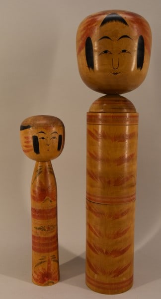 Two Kokeshi Japanese Wood Doll Signed: Featuring The Kokeshi Japanese Wood Doll 18 1/2" Tall And Signed Possibly Okuyama Kiyomi. The Second Kokeshi Japanese Wood Doll, Measures 12" And Is Signed. Both In Good Condition.