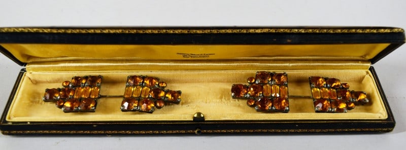 Pair Of Art Deco Amber Rhinestone Jabot: Featuring A Pair Of Jabot Pins With A Geometric Design And Amber Colored Rhinestones. Measuring 3 1/2" Long And 1 1/2" Wide, Both In Very Good Condition. Can Be Used As A Pin But There Are Loops Which