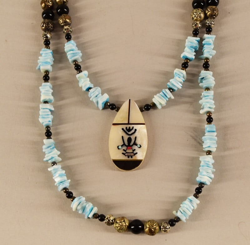 Zuni Or Navajo Native American Kachina Pendant: Featuring A Zuni Or Navajo Native American Kachina Pendant And Necklace. Measuring 22" With Liquid Silver Spacers And Beads With Blue Shell Beads.