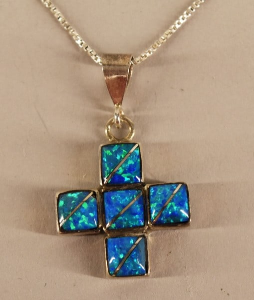Sterling Silver Crucifix Opal Necklace: Featuring A Sterling Silver Cross Necklace With Opals Pendant. The Opal Pendant Measures 1 1/4" Long And 1" Wide. The Sterling Necklace Measures 17" Long.