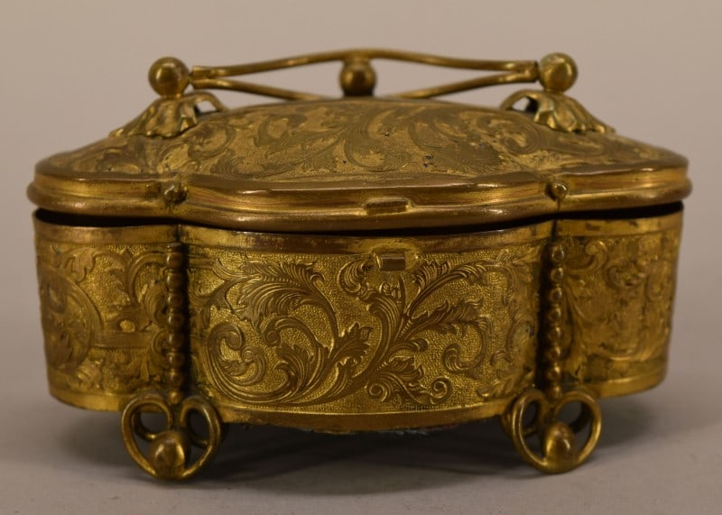 Art Nouveau Gild Bronze Jewelry Casket: Featuring A Gilt Bronze Jewelry Casket With An Ornate Flowing Design In An Art Nouveau Style. Measuring 2" Tall, 4" Long And 2 1/4" Deep, In Good Condition.