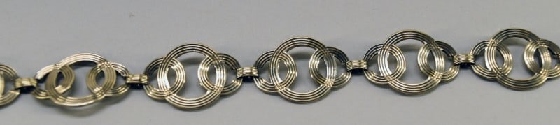 Symmetalic Sterling & 14k Gold Bracelet: Featuring Symmetalic Sterling & 14k Gold Bracelet With Interlocking Circles, Measuring 7", 11.8g
