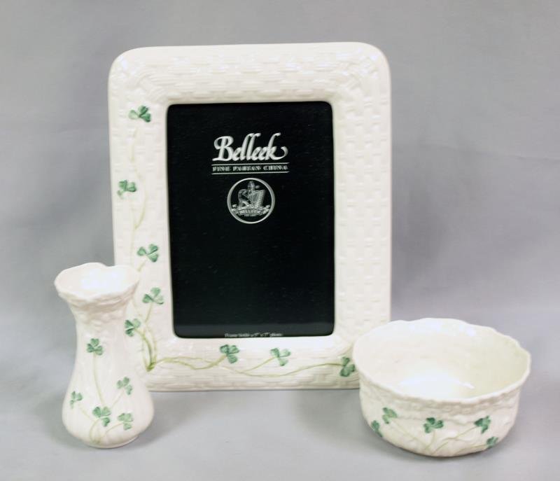 Collection of Belleek Parian china: Small vase, small BonBon dish and picture frame, all in good condition, in original boxes